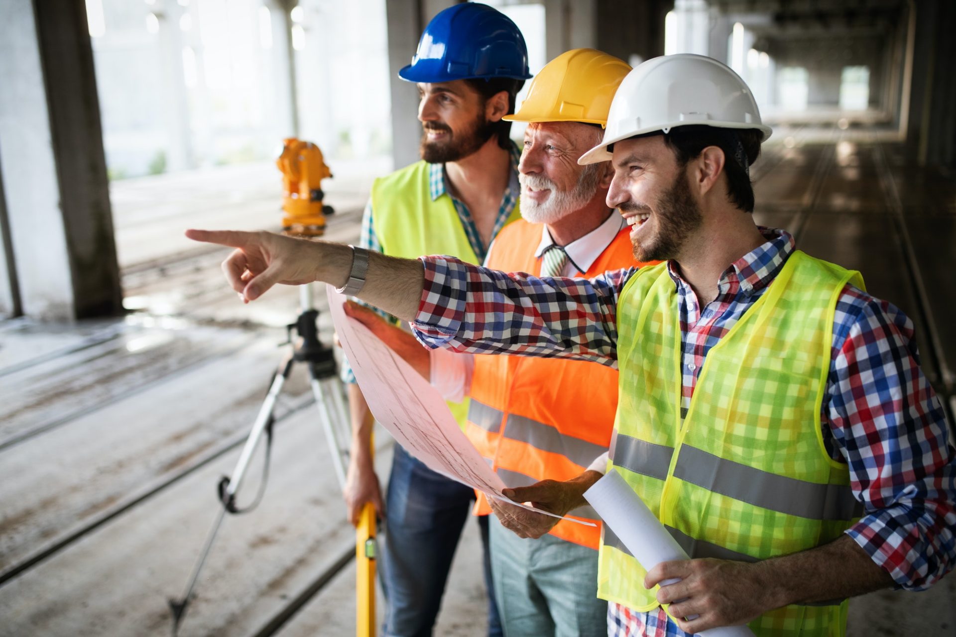 construction-engineer-with-foreman-worker-checking-construction-site-e1600416419290.jpg